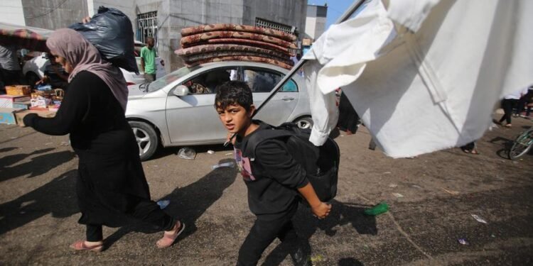 Gazans raise white flags to flee Israeli onslaught on foot