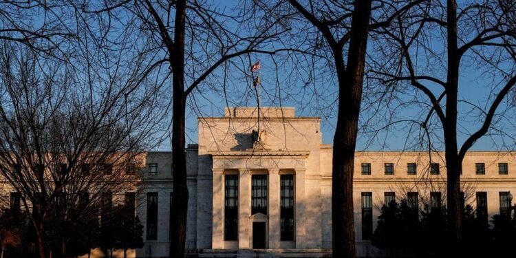 Fed cuts rates but sees slower pace of further reductions, firmer inflation