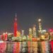 Oriental Pearl and Shanghai Tower, together with towers around the world, light up in red in celebration of the Spring Festival of the Year of the Snake