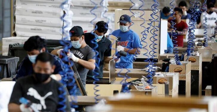 US goods trade deficit widens sharply in December on imports