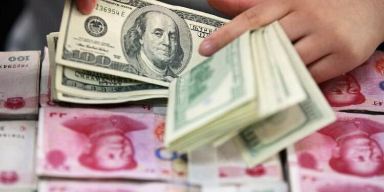 Dollar draws strength from Trump’s tariffs; crypto slumps
