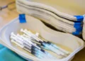 FDA panel recommends keeping COVID shots targeted to same strain as last year