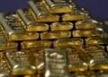 Gold rises as dollar eases ahead of US-China trade talks