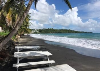 This Beach Town Is a Laid-Back Getaway With a Famous Rock, Wild Waves, and French Caribbean Charm