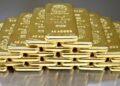 Gold inches up ahead of Fed verdict, silver powers to fresh records above $60