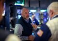 Wall St set to open flat as investors weigh labor data