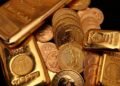 Gold falls as commodity index rebalancing sparks selling pressure