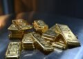 Gold tops $5,300 for first time, markets digest Fed rate verdict